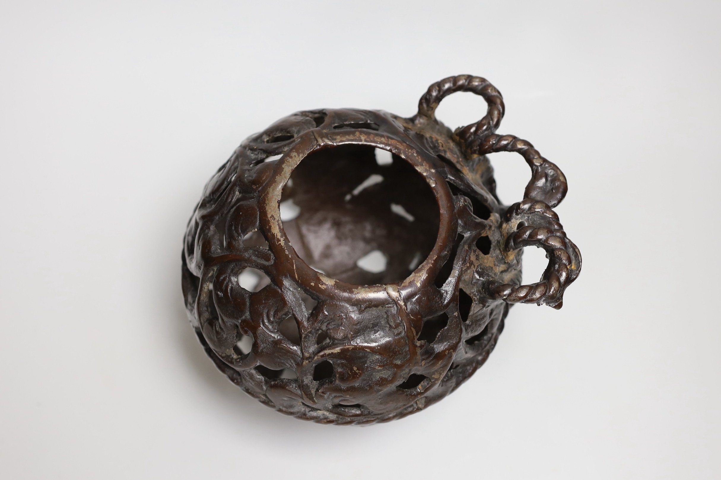A bronze incense burner or basket, 15cm